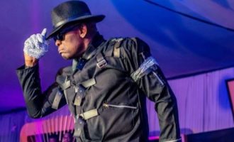 EXTRA: Tony Elumelu ‘turns’ Michael Jackson at office Christmas party