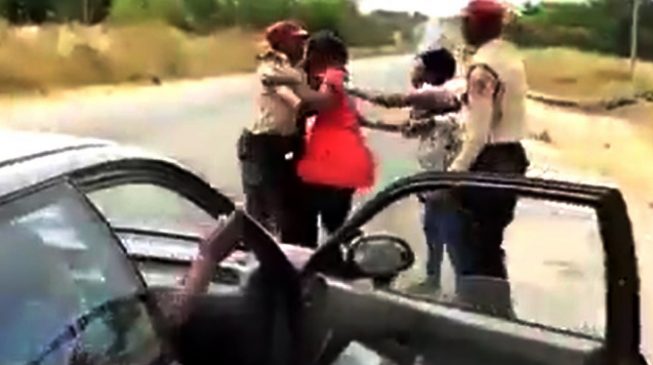 SHOCKING! FRSC officer engages woman in fist fight