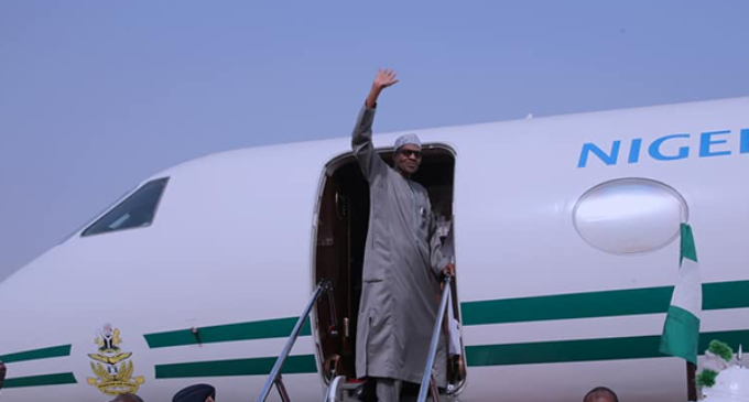 PHOTOS: Buhari off to AU summit