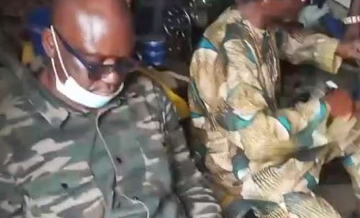 VIDEO: Fayose relaxes as cobbler works on his shoe