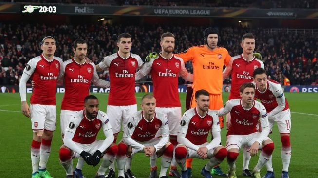 Arsenal, Atlético survive scare to advance; Lazio eliminated