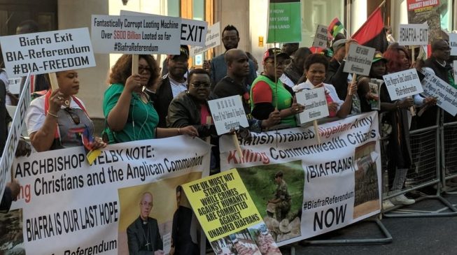PHOTOS: Biafra protesters storm Westminster as Buhari meets the Queen