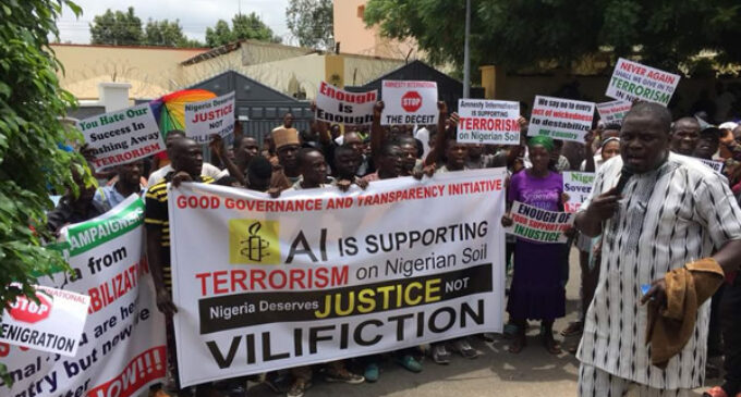 PHOTOS: Protesters storm Amnesty International’s Abuja office 24 hours to launch of report on rape