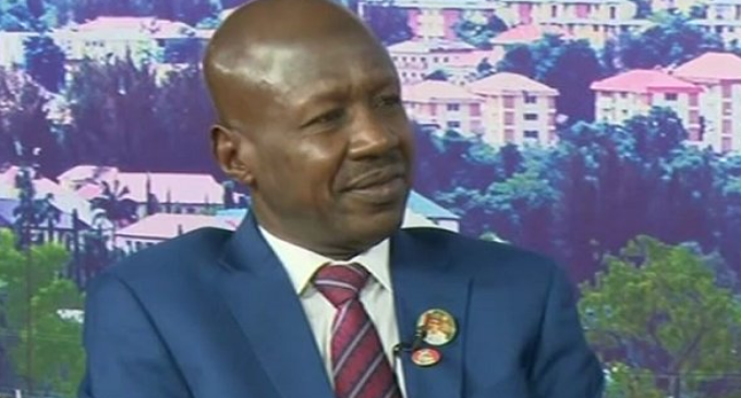 ‘A dent on our democracy’ — Nigerians hit Magu for donning Buhari’s reelection lapel