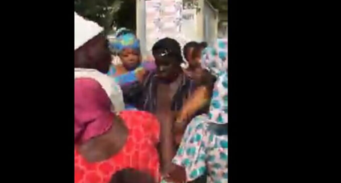 VIDEO: Protesters struggle for N500 after picketing Amnesty’s Abuja office