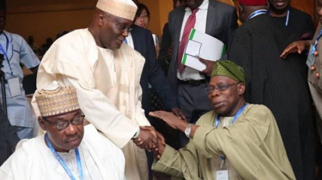PHOTOS: Aliyu Gusau ‘reunites’ Obasanjo and Atiku in Abuja