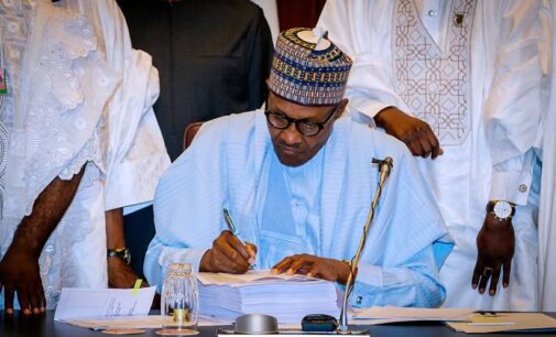 Buhari signs 2018 budget into law