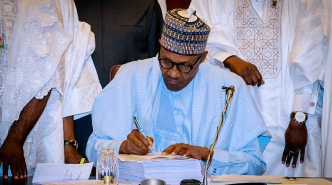 Buhari signs 2018 budget into law