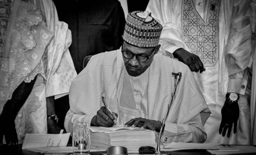VIDEO: The moment Buhari signed 2018 budget into law