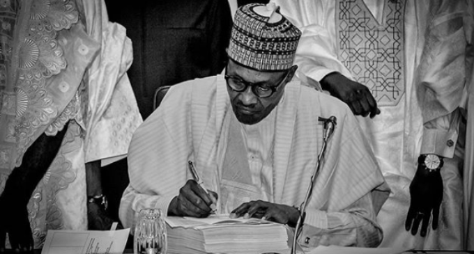 VIDEO: The moment Buhari signed 2018 budget into law