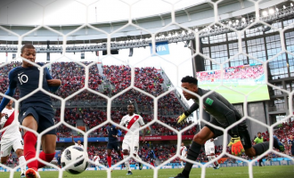 Solitary Mbappe goal takes France to next round in scrappy win