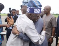 PHOTOS: Tinubu hugs Atiku at Akure airport