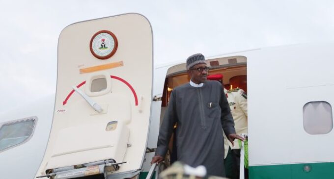 Buhari returns to Abuja after economic summits in Jordan, Dubai