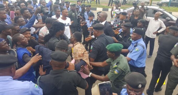 Police teargas protesters demanding release of detained Premium Times journalist