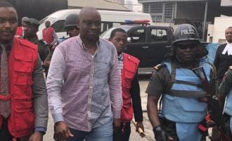 PHOTOS: EFCC operatives lead Fayose to court