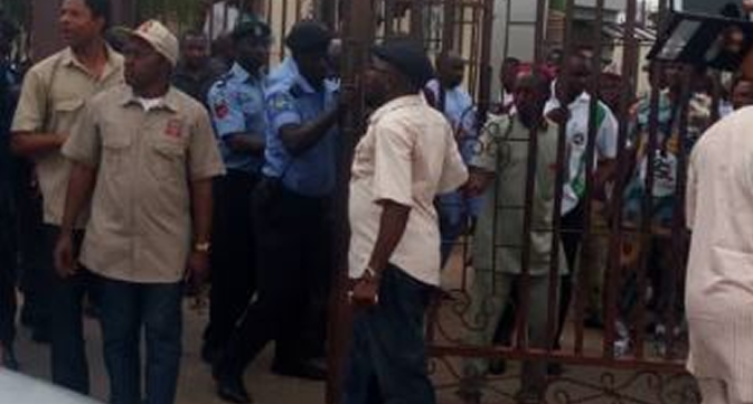 Police fire teargas at NHIS workers, escort suspended ES into office