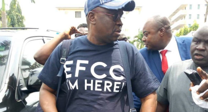 ‘I’m here’ — Fayose storms EFCC office with his bag of clothes