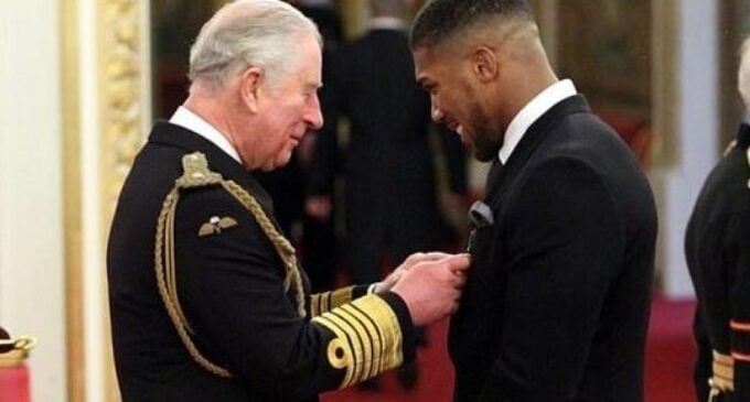 Anthony Joshua receives OBE from Prince Charles