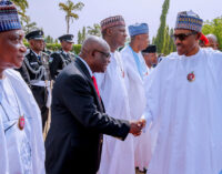PHOTOS: Buhari, Onnoghen in ‘warm handshake’ for fallen soldiers