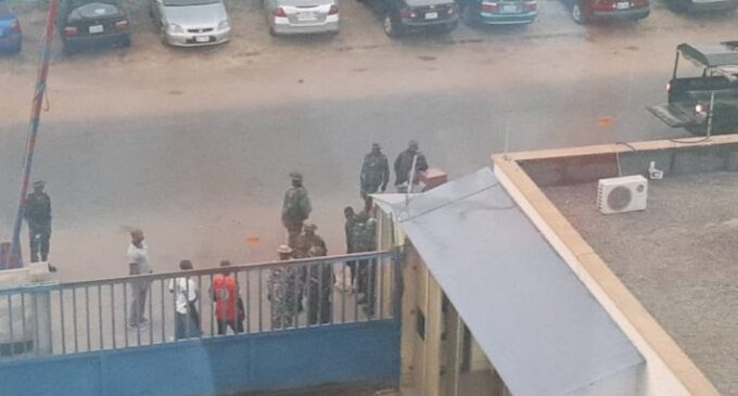 Editor, reporter arrested as soldiers invade Daily Trust offices in Lagos, Abuja, Borno (updated)