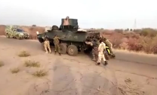 TRENDING VIDEO: Nigerian soldiers push armoured tank on battle field