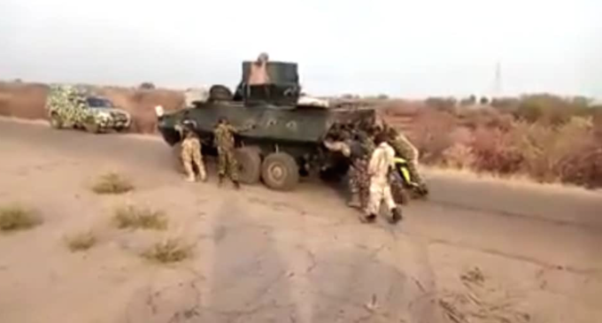 TRENDING VIDEO: Nigerian soldiers push armoured tank on battle field