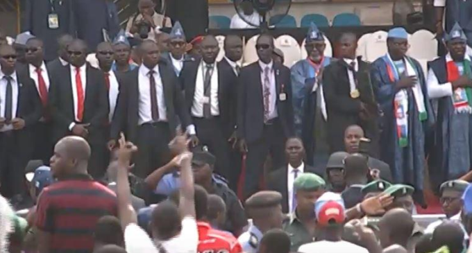Security operatives shield Buhari as violence breaks out at Ogun APC rally