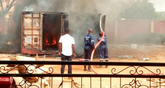 Container laden with card readers on fire at INEC office in Anambra