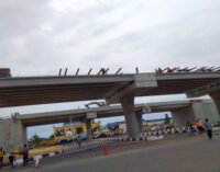 PHOTOS: Construction still going on at Lagos airport road — 48 hours after inauguration by Buhari