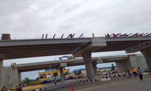 PHOTOS: Construction still going on at Lagos airport road — 48 hours after inauguration by Buhari