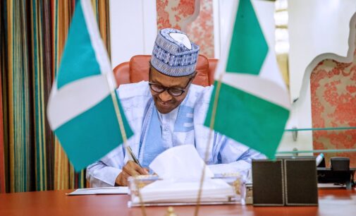 Workers to earn N30k as Buhari signs minimum wage into law