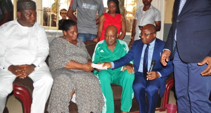 Otedola presents $50,000 cheque to Christian Chukwu for foreign medical treatment