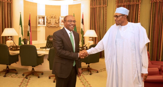 PHOTOS: Emefiele all smiles as Buhari congratulates him over his reappointment