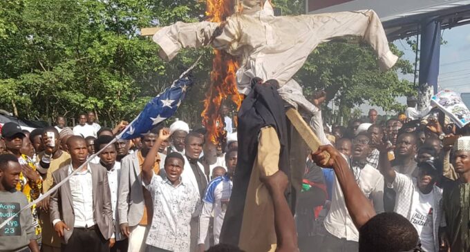 Shi’ites set US flag on fire in Abuja