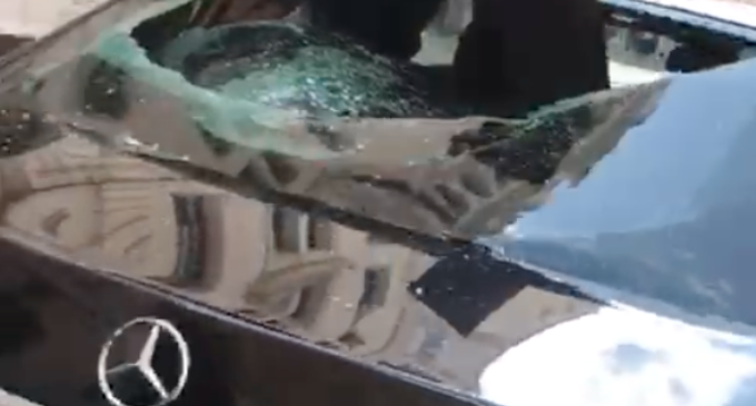 VIDEO: Angry over passport, man vandalises cars at Nigerian high commission in UK