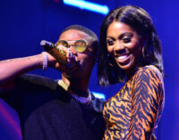 ‘He even grabbed her bum’ — reactions as Wizkid, Tiwa Savage share kiss on stage