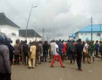 PHOTOS: Epe residents attack EFCC outside Ambode’s residence