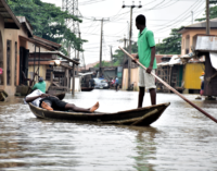 In flooded Lagos community, canoe replaces Uber and children are on forced holiday