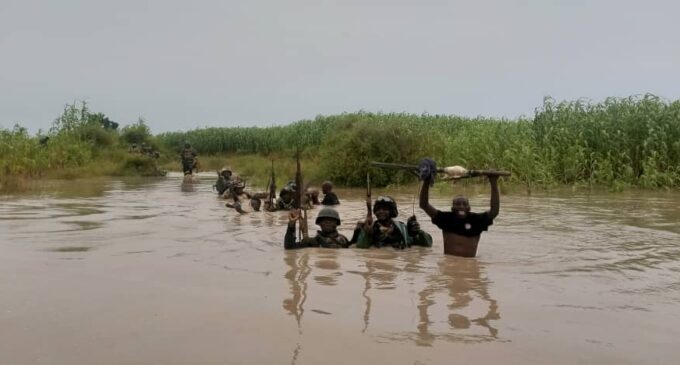 PHOTOS: Soldiers risk their lives in the river — just to stop Boko Haram