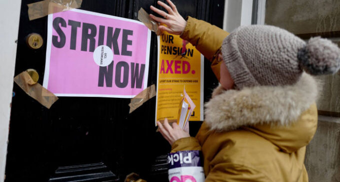 UK university lecturers begin eight-day strike over pay, pensions