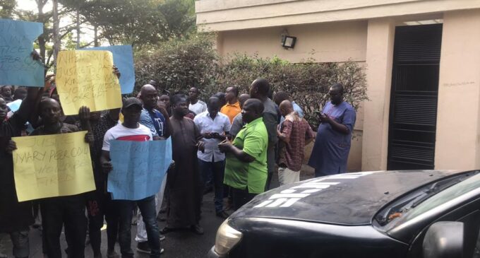 PHOTOS: Protesters block Mary Odili’s residence over s’court judgment on Bayelsa