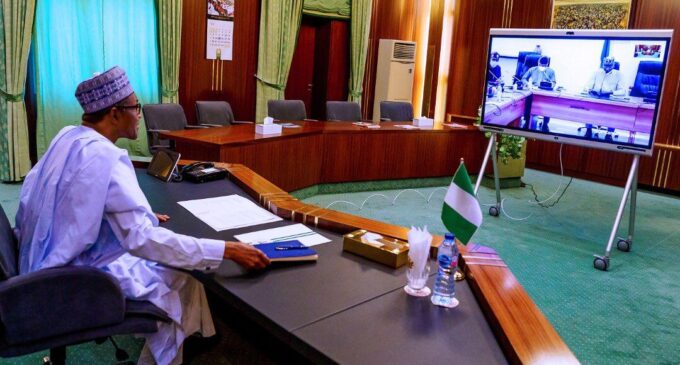 PHOTOS: Buhari holds teleconference with task force on COVID-19