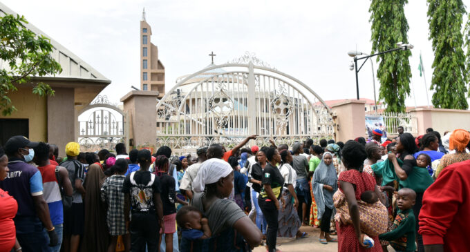 PHOTOS: IDPs troop to Catholic Church in Abuja on Good Friday, demand food