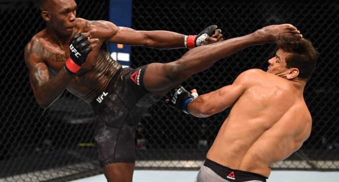 Israel Adesanya knocks out Brazil’s Paulo Costa to retain title