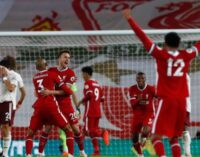 Liverpool overcome Arsenal to maintain perfect start