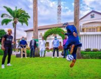 PHOTOS: Sanwo-Olu shows off football skills during Oshoala’s visit
