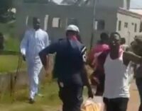 EXTRA: Civil defence officer spotted looting COVID-19 relief items in Abuja (video)