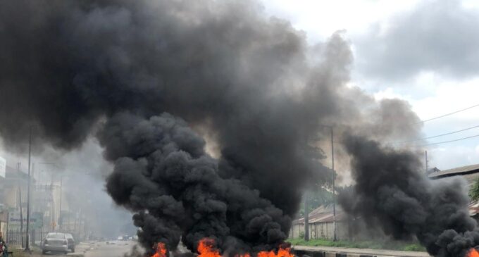 PHOTOS: Hoodlums set police station, BRT buses ablaze in Yaba