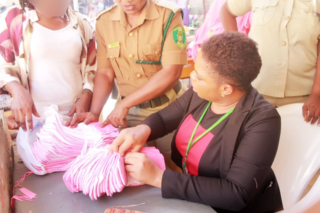 Dorcas Igharewa screening pads produced by the inmates