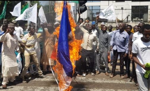 Shi’ites set French flag ablaze in Abuja over Macron’s ‘controversial’ comment
